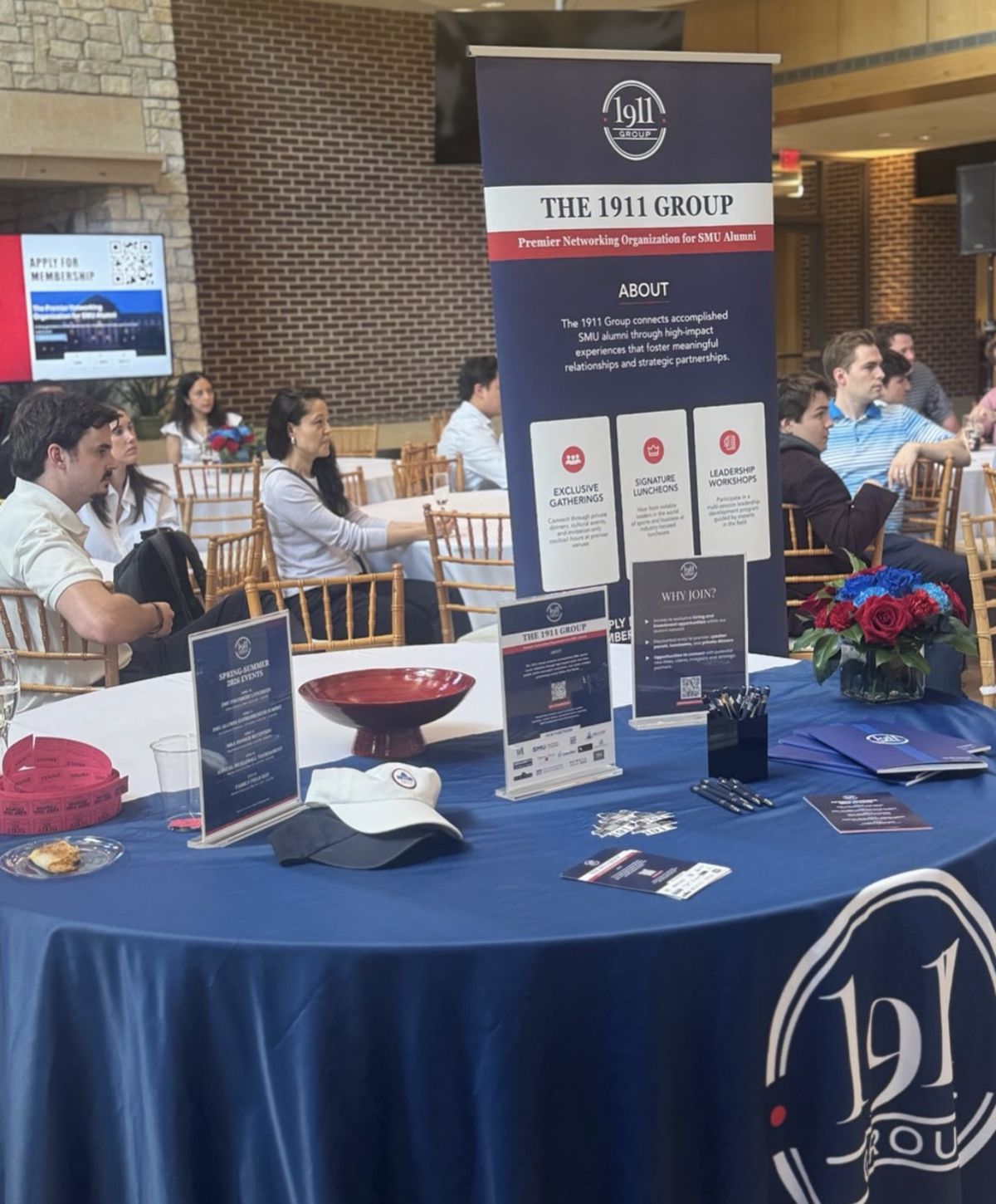 Branded 1911 Group welcome table and signage